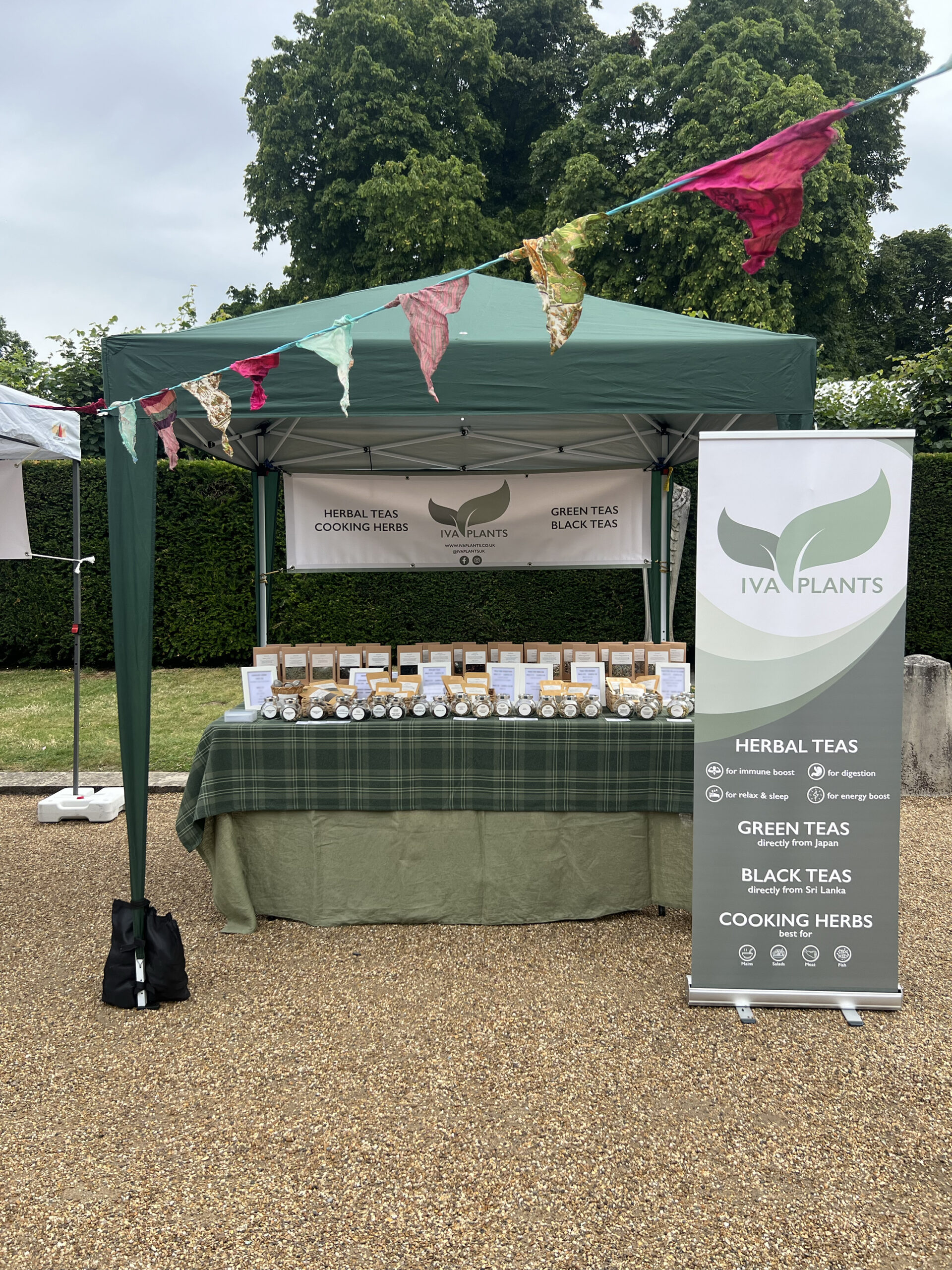 IVA Plants stall at Duck Pond Market, Chiswick House & Park, offering herbal, Japanese green, and black Ceylon teas
